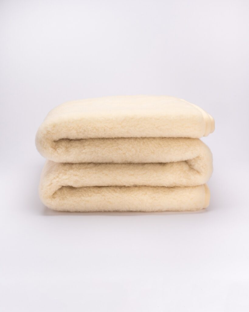 WOOLLAND laste meriinovillast kerge tekk - lohutuspadi