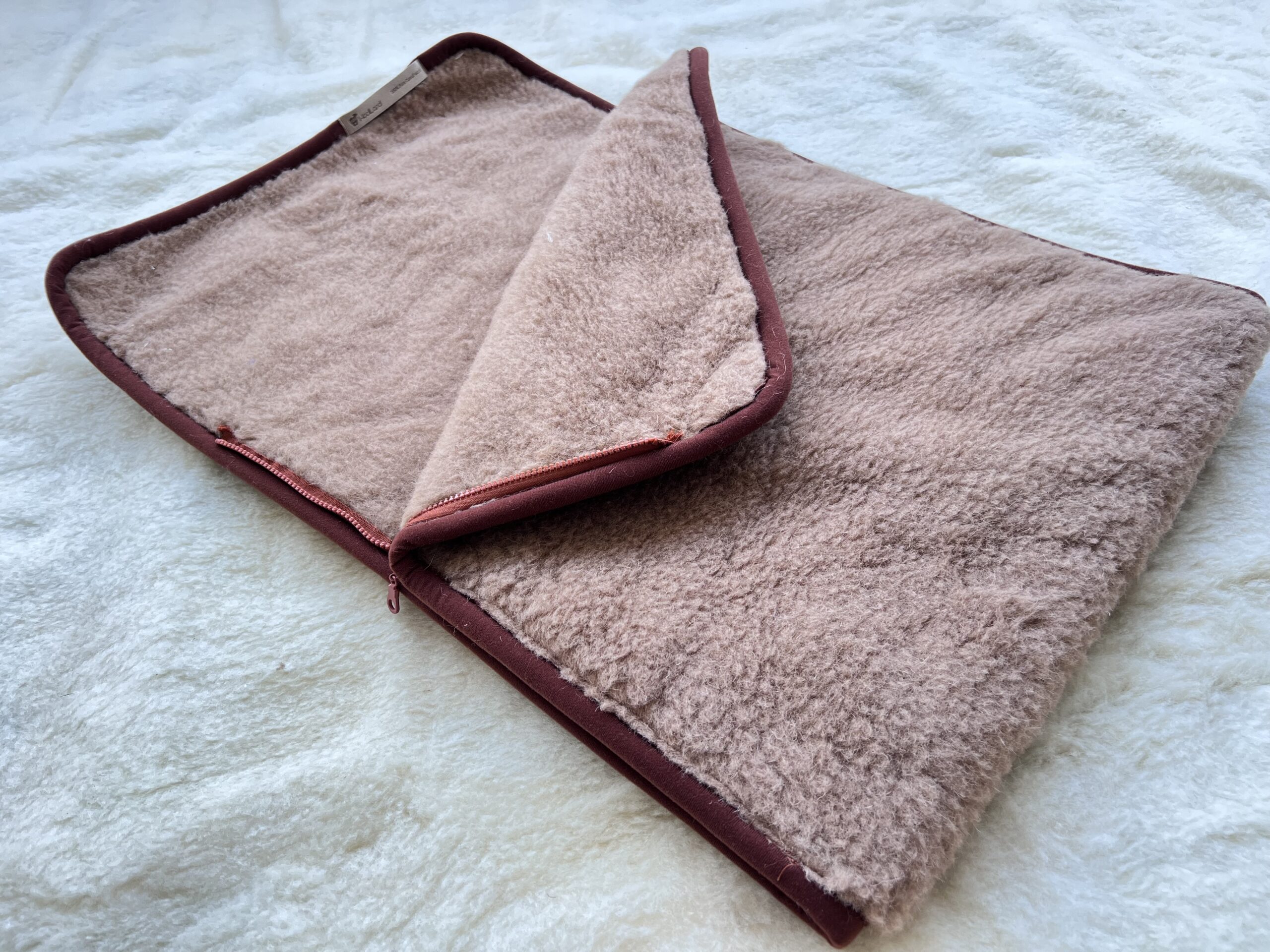 WOOLLAND Camel fliisist ümbrik beebile